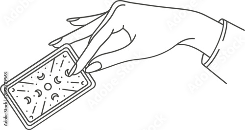 Fotografía Mystical hand holding tarot card with moon phases, celestial fortune telling lin