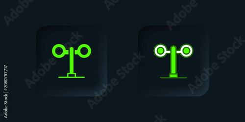 Foto Green Train traffic light icon isolated on black background