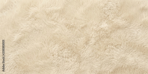 Photos Soft Cream Fur Texture: A luxurious close-up of thick, plush faux fur in a soft cream shade, creating a cozy and inviting tactile surface perfect for elegant design backdrops
