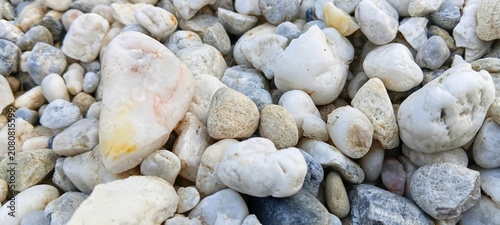 Photography High resolution texture of small river pebbles background
