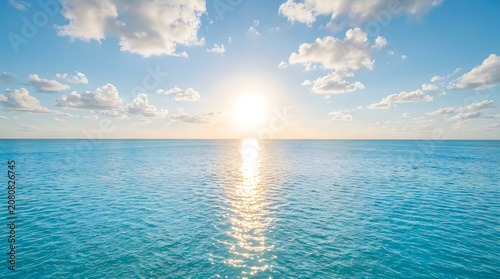 Serene ocean horizon with natural cloud formations and bright sunlight
