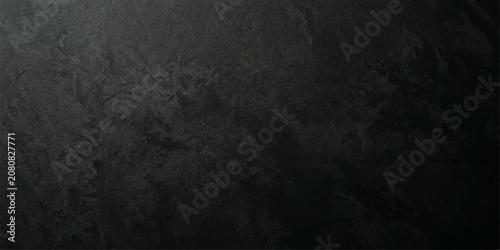 Abstract black slate stone background, textured black slate with mottled surface and dark vignette corners, modern design for cover, poster and wallpaper.