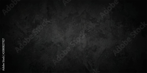 Elegant black slate stone wall backdrop with abstract grunge texture, black slate with textured mottled surface and subtle grey blue tone, copy space for banner, presentation and cover.
