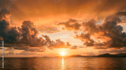 Natural cloud formation at sunset over serene ocean