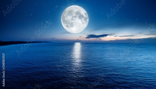 Full Moon Over Calm Sea At Night