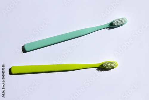 
This is a collection of colorful toothbrushes.