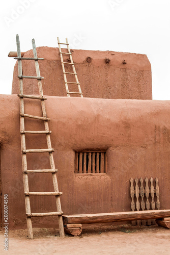 Adobe Building with Wooden Kiva Ladders