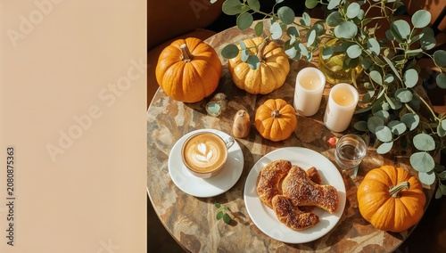 Coffee and Pastries on a Table With Pumpkins and Candles in a Cozy Setting Du...