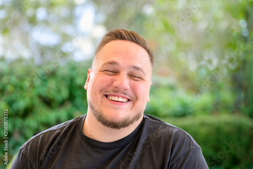 Happy Young Man Laughing Naturally