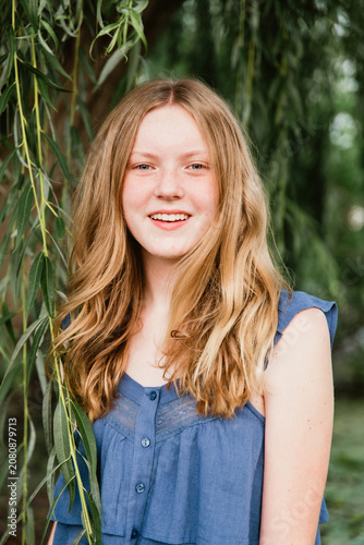 portrait of a girl by weeping willow tree