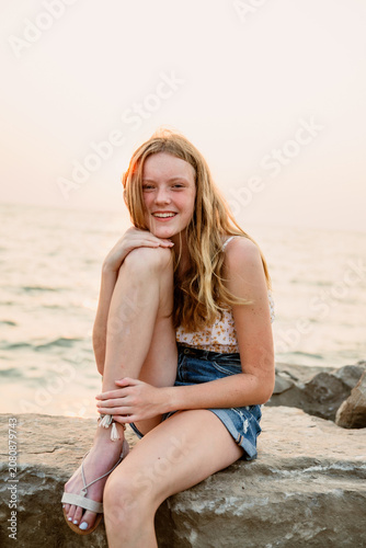 Portrait of a girl sitting on the shore