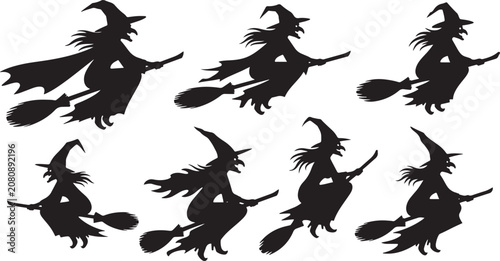 Tableau sur toile Witches flying on broomsticks editable vector silhouette illustration