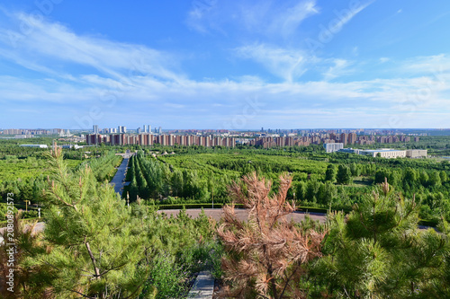 Scenic Panorama of Ordos City in Inner Mongolia Featuring High Rise Buildings and Urban Architecture
