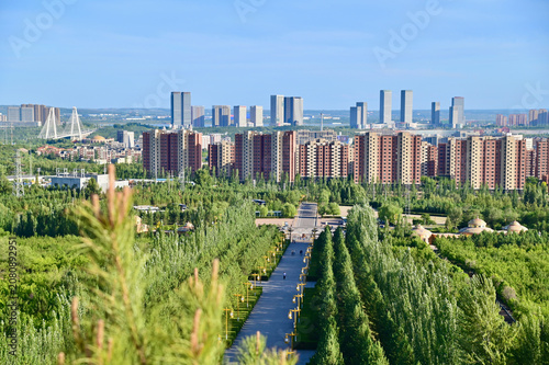 Modern Skyline of Ordos City Surrounded by the Vast Landscapes of Inner Mongolia, China