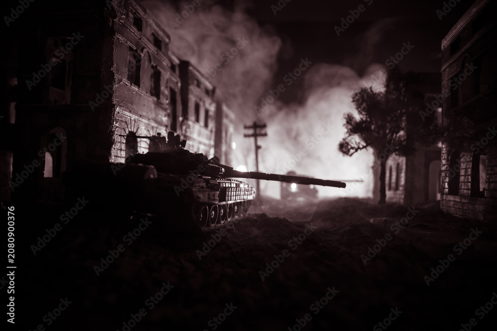 Fototapeta premium War Concept. Military silhouettes fighting scene on war fog sky background, World War Soldiers Silhouette Below Cloudy Skyline At night. Battle in ruined city.
