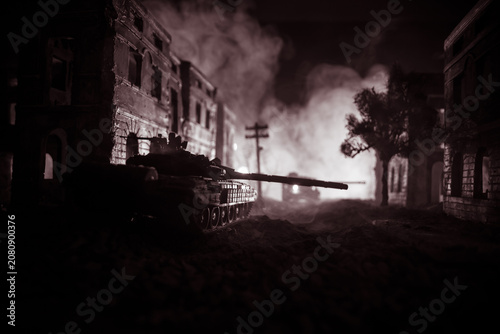 War Concept. Military silhouettes fighting scene on war fog sky background, World War Soldiers Silhouette Below Cloudy Skyline At night. Battle in ruined city.