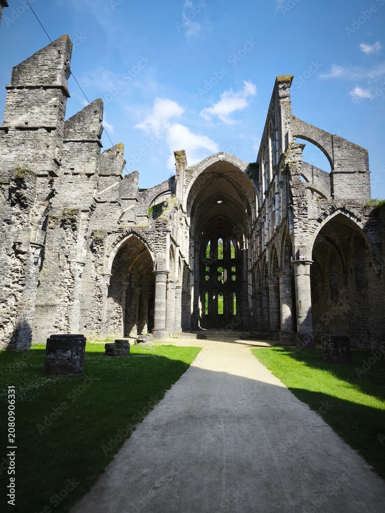 Fototapeta premium Stunning view of medieval Belgian abbey architecture under natural light.