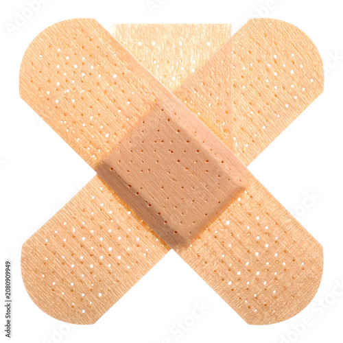 Crossed classic fabric adhesive bandages traditional medical first aid plaster patch elements for wound care protection graphic