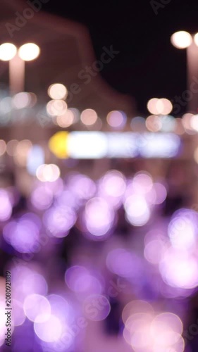 Aesthetic Blurred Night Scene Featuring Soft Purple Lights and Bokeh Effect, Capturing the Essence of an Enchanted Evening Atmosphere