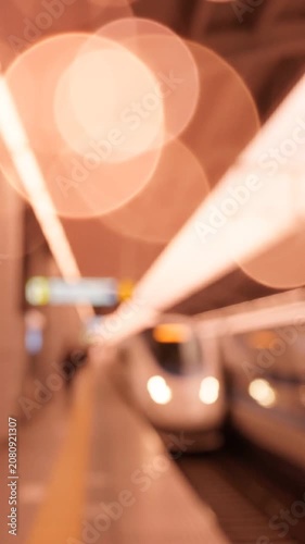 A Blurry Journey of Motion: Capturing the Essence of a High-Speed Train Station with Dynamic Bokeh Effects and Evolving Light Patterns