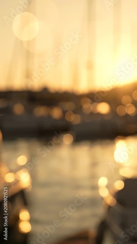 A Beautiful Sunset Over a Marina Filled with Boats, Capturing the Soft Glow of Golden Lights Reflecting on the Water's Surface