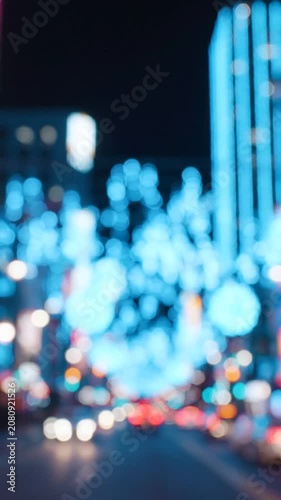 A Dreamlike Urban Scene Glimmering with Colorful Lights, Capturing the Enchantment of City Nights Filled with Vibrant Bokeh Effects and Festive Ambiance