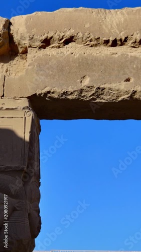 Dendera temple Hathor head columns with cow ears supporting massive stone