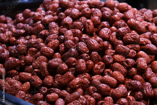 Bild auf Leinwand Pile of Dried Red Dates in Market Display