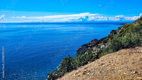 Canvastavla Scenic view of the Mediterranean sea from the cliffs of Elba Island with Pianosa island on the horizon