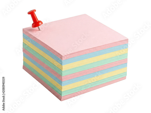 Stack of colorful sticky notes with push pin isolated on a transparent background
