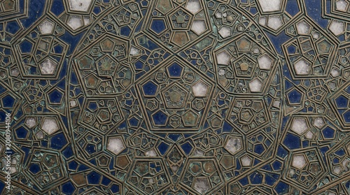 Intricate Geometric Islamic Pattern Featuring Ornate Mosaic Tiles and Ancient Architectural Metalwork Craftsmanship