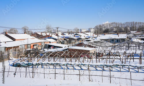Snowy Rural Village Landscape in Winter