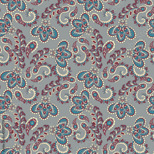 Floral seamless pattern with paisley ornament. Vector illustration in asian textile style