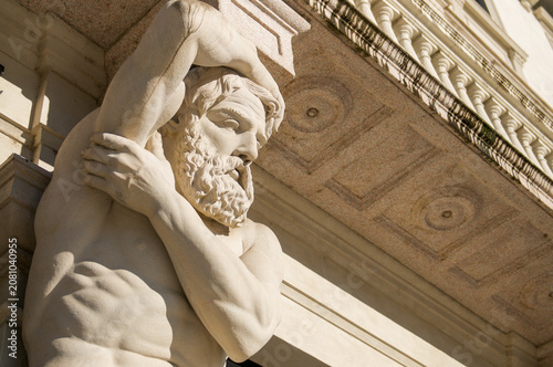 Low angle close up of Omenoni statue at Grand Palace in Lugano