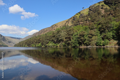  Picturesque mountain lake surrounded by mountains, Upper Glendalough Lake, County Wicklow, Ireland.