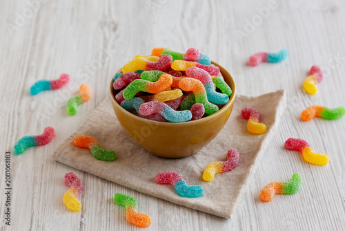 Sugary Sour Gummy Worms in a Bowl, side view.