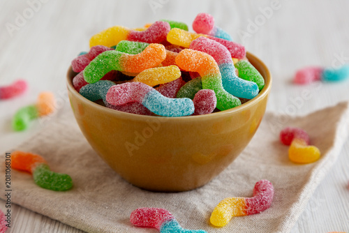 Sugary Sour Gummy Worms in a Bowl, side view.