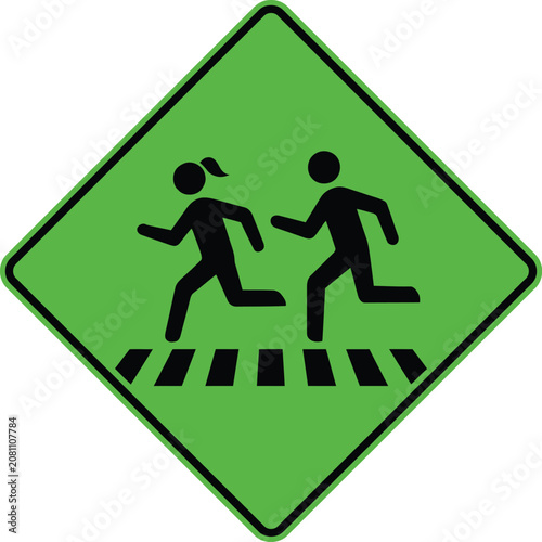 Green diamond road sign with black silhouette of children crossing the street