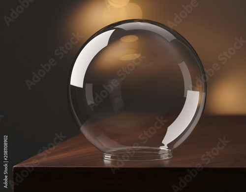 Empty Clear Glass Sphere Display Dome Sitting on a Polished Wooden Surface with Soft Warm Ambient Lighting