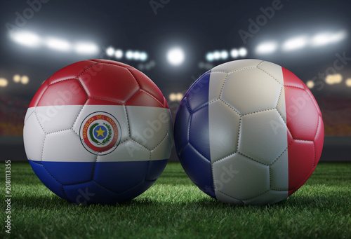 Two soccer balls in flags colors on a stadium blurred background. Paraguay vs France.