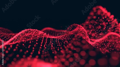 A dark scene showing red, undulating lines of blurred, glowing dots with a dark blue backdrop