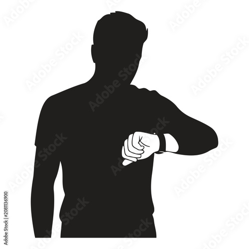 Silhouette of a man checking the time on his wristwatch