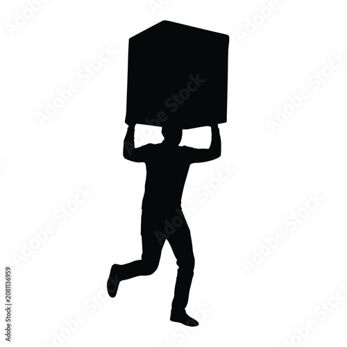 Silhouette of a person running while carrying a large heavy box