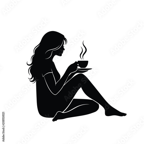 Silhouette of a young woman enjoying a hot morning coffee