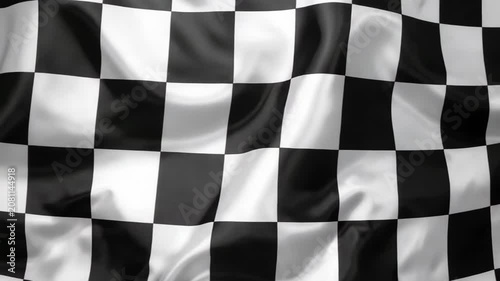 Close-up of a black and white checkered flag waving with soft fabric folds and texture, racing finish line symbol, motorsport and competition imagery.