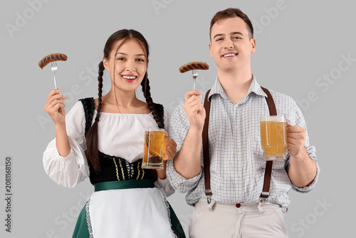 Young happy couple in tradi...