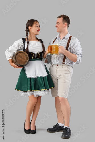 Young happy couple in tradi...