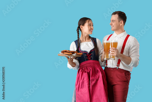 Young happy couple in tradi...