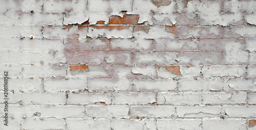 Εκτύπωση καμβά Horizontal close up view of a deteriorating white painted red brick and mortar w