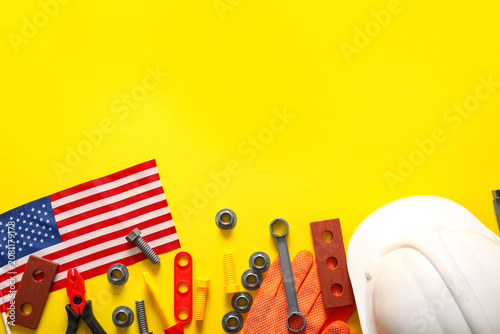 USA flag, hardhat and toy t...